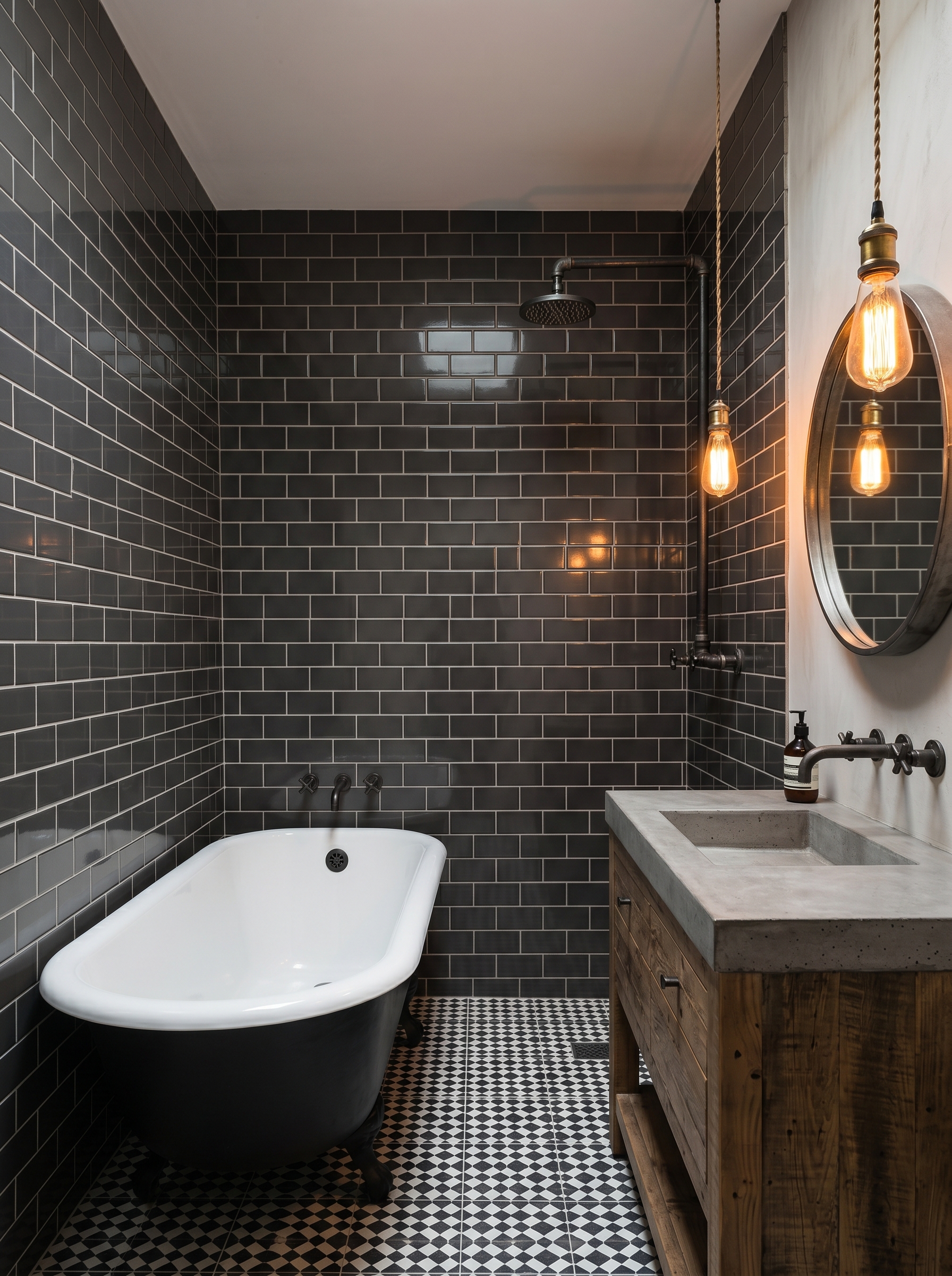 Frameless glass walk-in shower with large-format porcelain tile and niche shelf